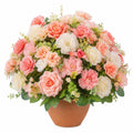 Arrangement de fleurs artificielles en pot de couleur pêche et blanc
